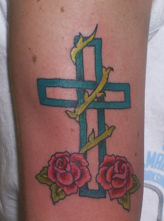 Looking for unique Joe Smith Tattoos?  cross with roses