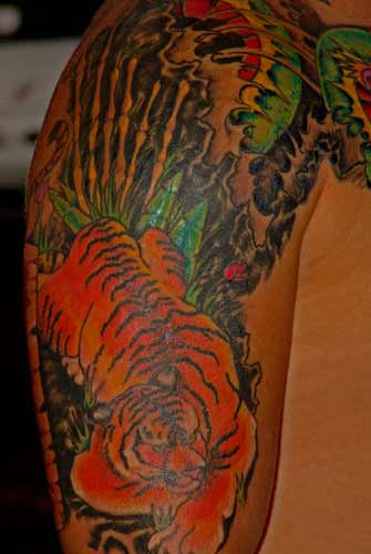 Tattoo Galleries: tiger snake Tattoo Design