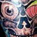 Tattoo Galleries: Snake Slithering through Skull Tattoo Design