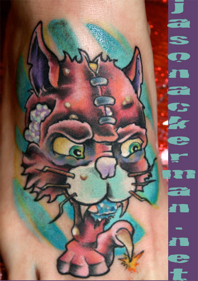 Jason Ackerman - severed cat head foot tattoo