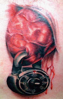 Looking for unique Tom Strom Tattoos?  heart tattoo