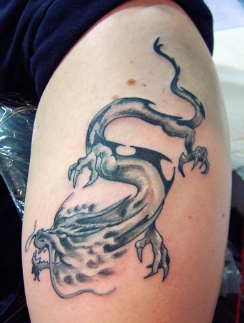 Looking for unique Jason Riddick Tattoos?  Dragon done at 