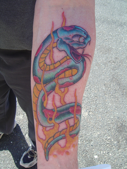 Looking for unique Color tattoos Tattoos?  snake on forearm