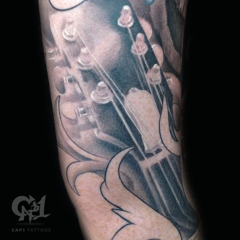 Cap1 Tattoos : Tattoos : Body Part Arm Sleeve : Realistic Guitar Headstock  Tattoo