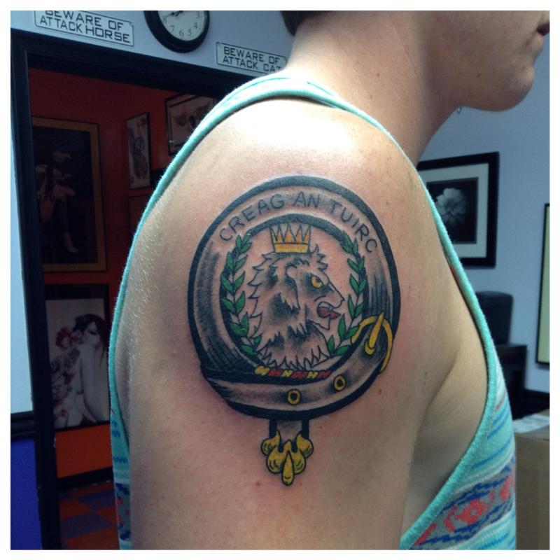 lion family crest tattoo