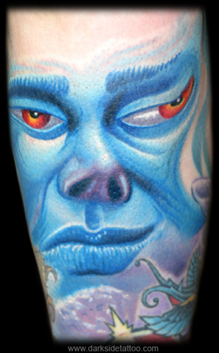 Tattoo Galleries: Melting Face Tattoo Design