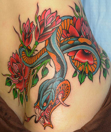 To get a traditional snake tattooed on the top and side of my boob or not 