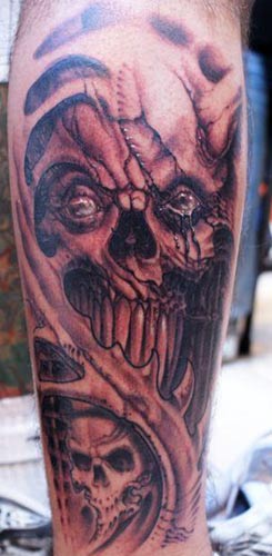 Comments Black and grey skull tattoo with a bit of bio
