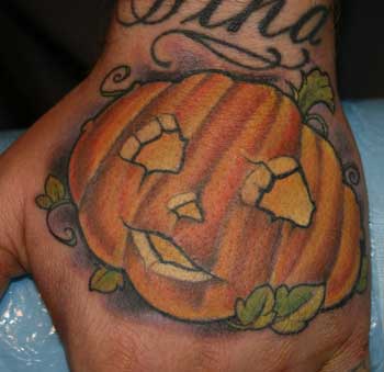 Looking for unique  Tattoos? pumpkinhand