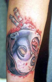 Looking for unique  Tattoos? Severed Junkie Head