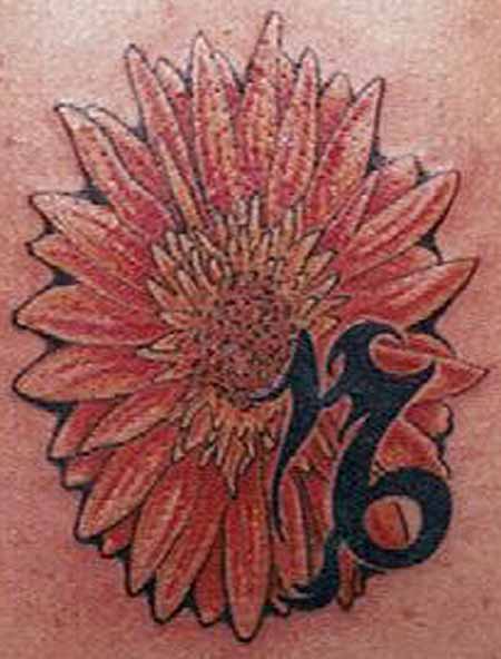 Flower and symbol tattoo