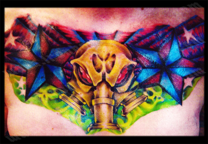 thats a cool mask tattoo i saw similar ones at 