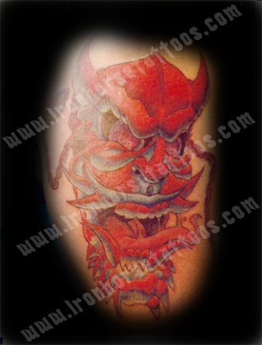 red devil tattoo. Comments: Red devil on the arm