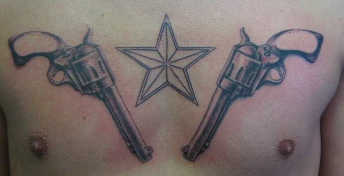 nautical star tattoos on chest. Comments: Nautical star and Revolvers tattoo on chest. Piece in progress.