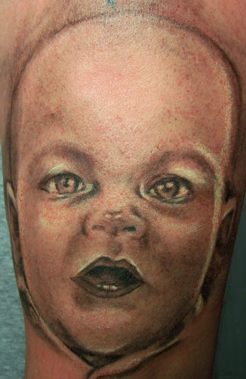 Realistic Tattoos. baby face