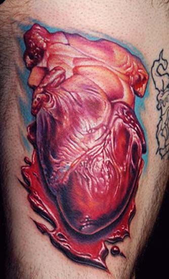 human heart tattoo. realistic human heart