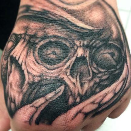 Outlaw Tattoo : Tattoos : Custom : Skull Hand Tattoo