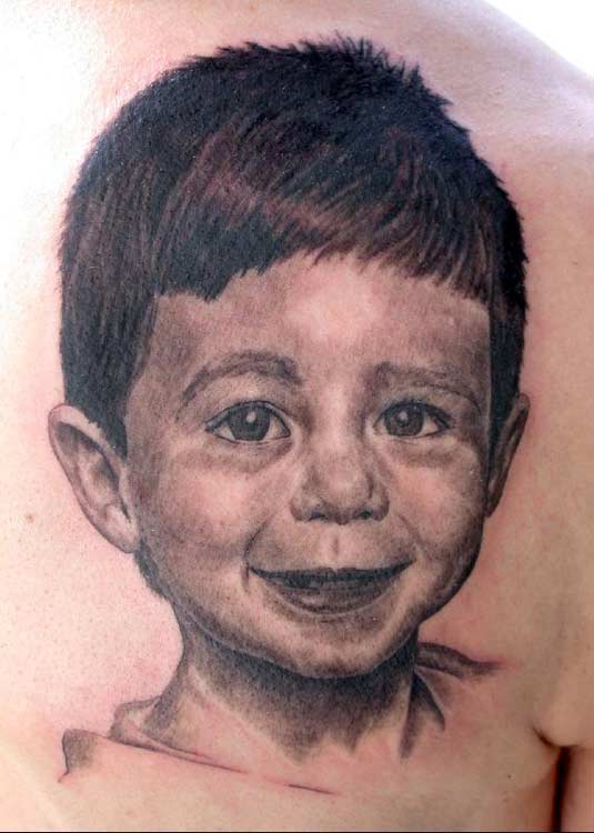 Black and gray child portrait. Artist: Phil Young - (email) Placement: Back