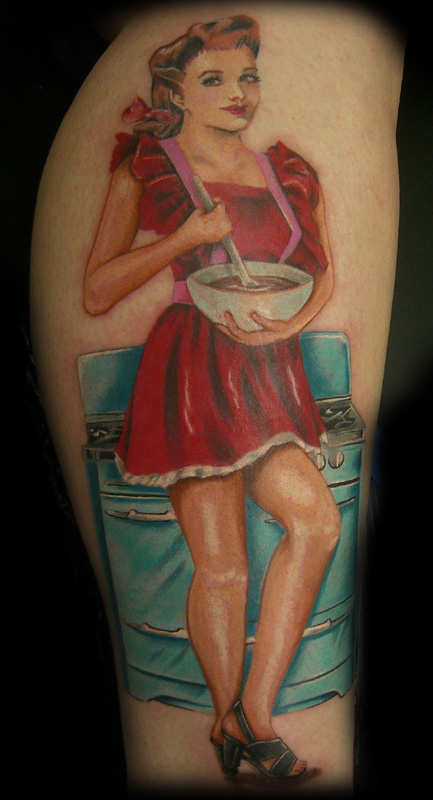 Comments: Pin-up on leg. Tattoos