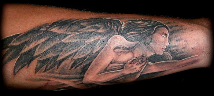 Cross Tattoos Arm. cross tattoos with wings on