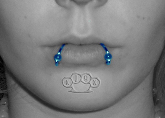 piercings on lip. more lower-lip piercings