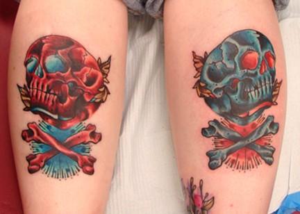 New School Tattoos couple of skull using opposing colors