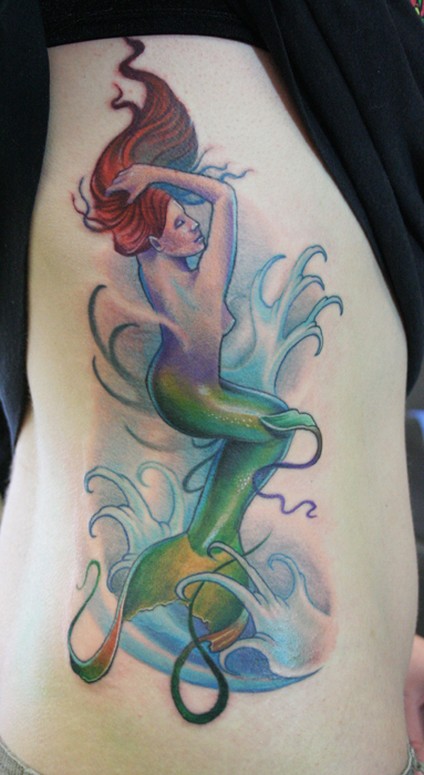 Comments: Mermaid on ribs. Tattoos