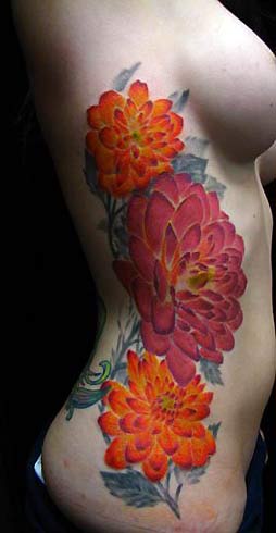 flower rib tattoos. Jeff Croci - Flowers on Rib