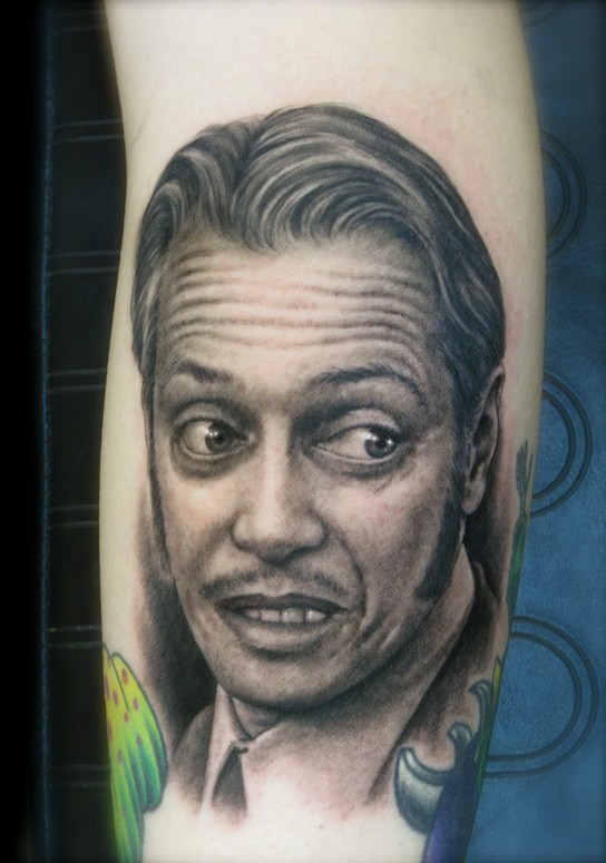 realistic black and gray portrait tattoo of Steve Buscemi by Shane