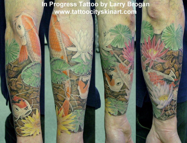 koi sleeve tattoos. on the koi pond sleeve I