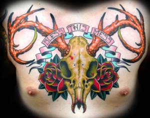 Deer Skull and traditional roses tattoo