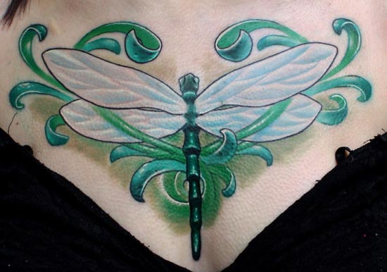 Dragonfly chest tattoo