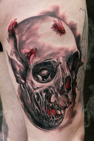 Skull and bees tattoo