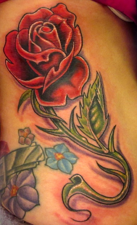 Placement Ribs Comments custom rose tattoo Didn't do the other tattoo