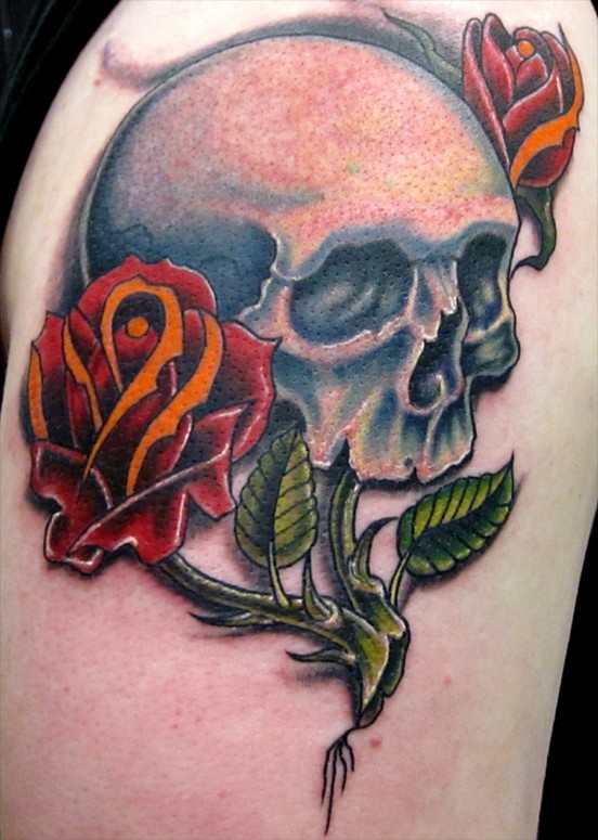 Comments i think skulls and roses always make for a nice tattoo