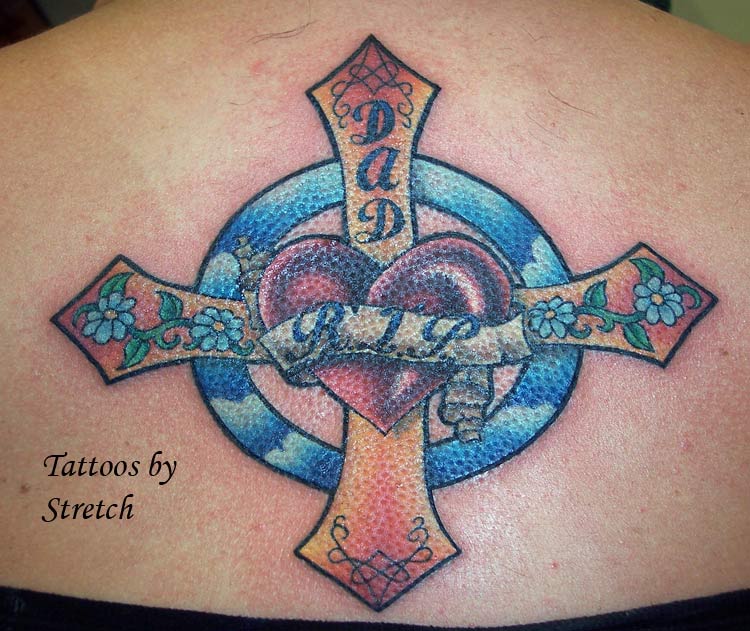 rip cross tattoo
