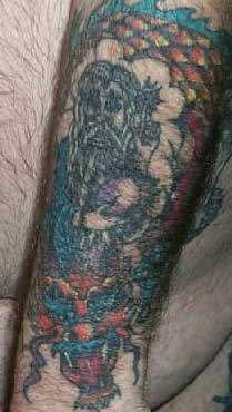 Really bad tattoo Tattoo Galleries: Dragon and Wizard
 design