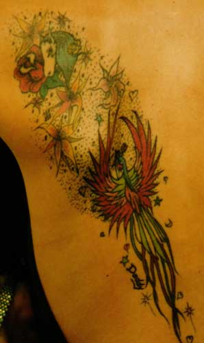 Wildlife Designs Tattoo Galleries: Bird with flowers design