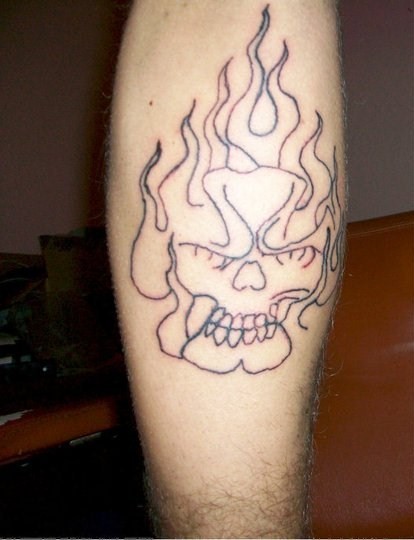 Bad Tattoos - skull and flames. Large Image Leave Comment